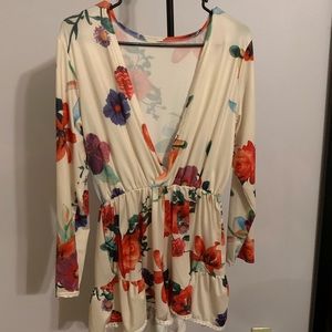 Cream romper with multi colored flowers